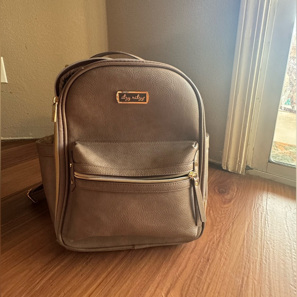 NWOT Itzy Ritzy Diaper Bag mini taupe with new changing pad